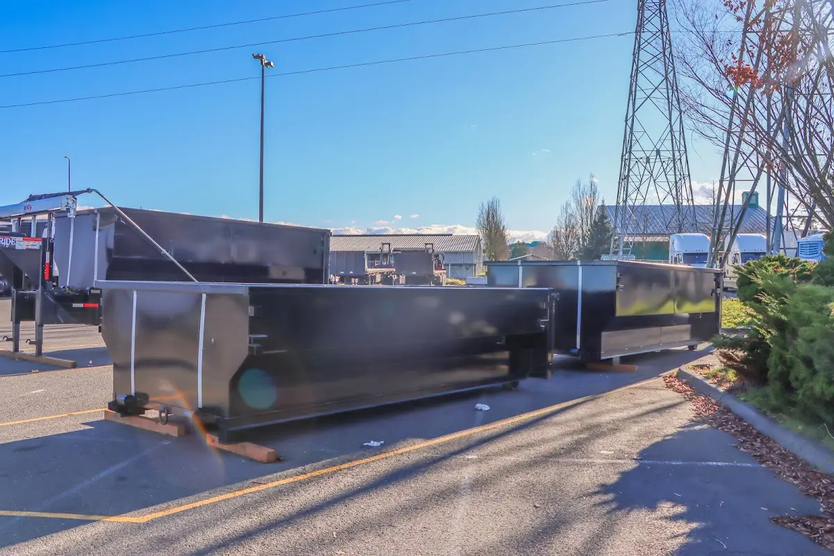 Roll-off dumpster ready for waste disposal at job site for Construction Dumpster Rental in San Juan